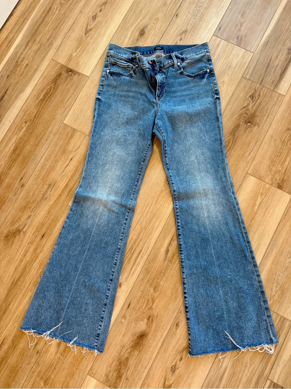 Express Medium Blue 70’s Flare Jeans with Raw Hem